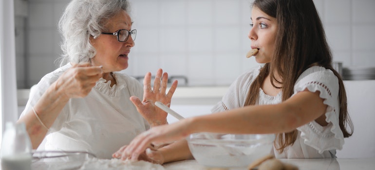 grandmother with granddaughter having interesting conversation on Evolution of self-storage in the US