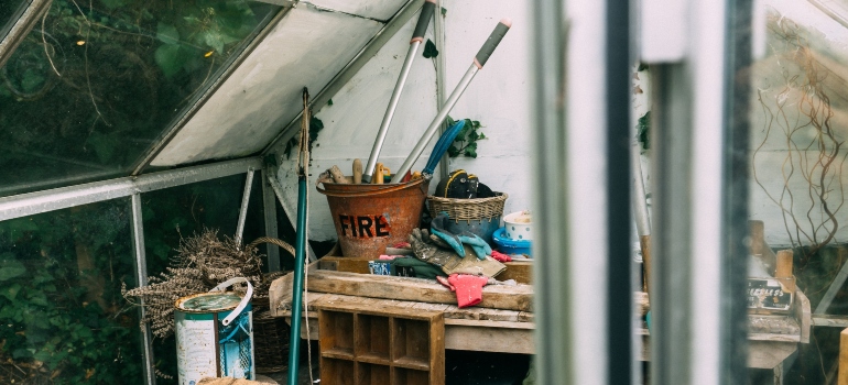 Picture of gardening tools in off-season equipment storage