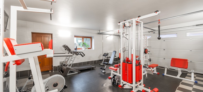 Home gym with equipment in basement