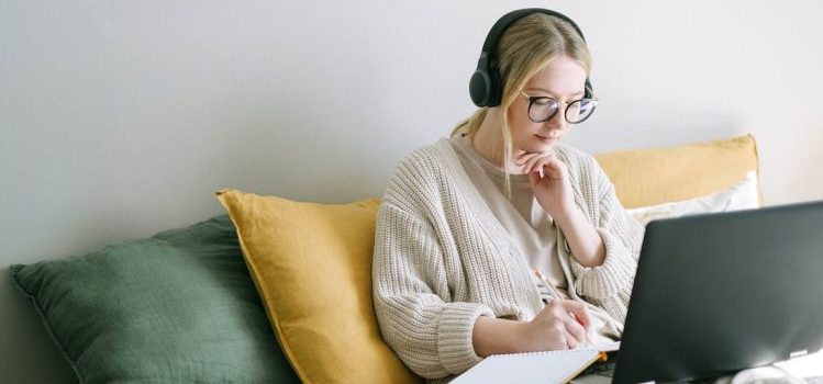 A woman checking something on her laptop