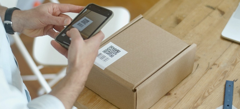 A Person Scanning a QR Code