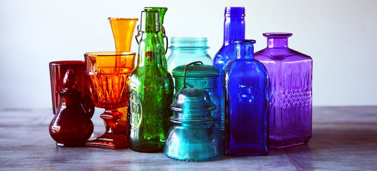 Assorted-color translucent glass containers