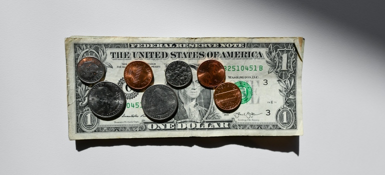 A dollar bill and some change