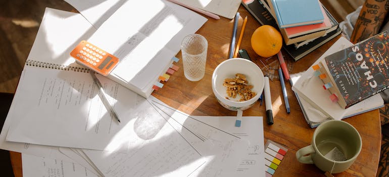 Mess on the desk as example how not to create a homework station for your kids