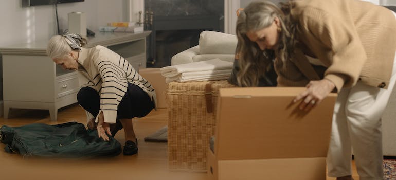 Two Women Packing their Things