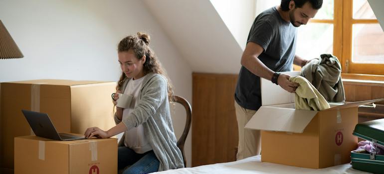 A couple packing shows how to balance work and moving in Seattle