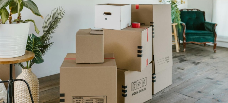 Cardboard Boxes on Wooden Floor