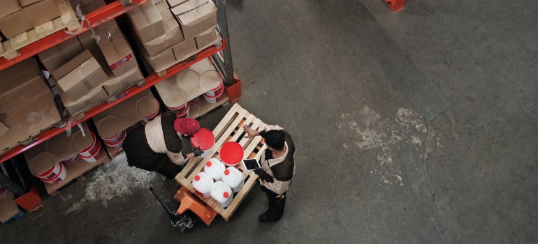 Two Men Working in a Warehouse