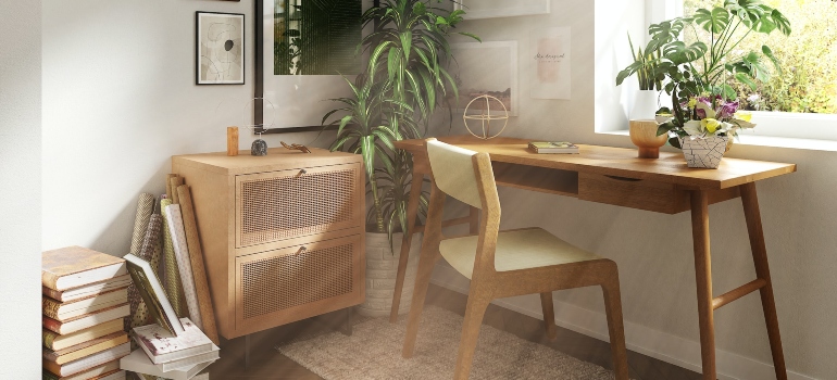brown wooden table with books on top