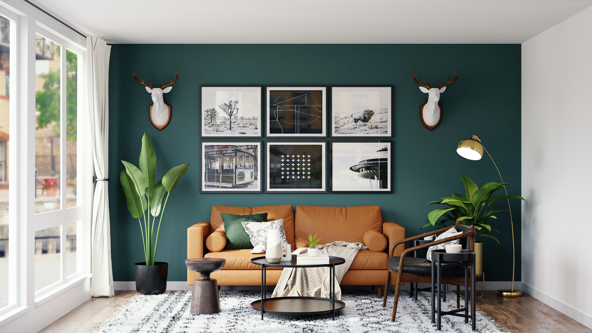A living room with brown wooden framed white padded chairs