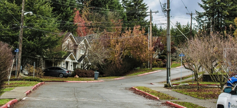 Single-family home with a car in Kirkland WA real estate market