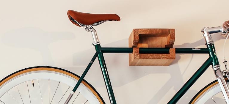 A bike hanging on a rack