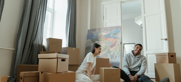 A couple preparing items for a family storage