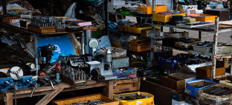 Cluttered workspace with tools and equipment