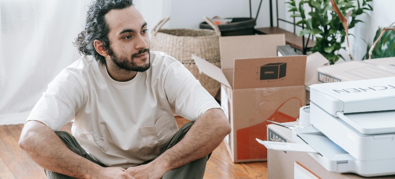 man thinking about Space saving packing tips