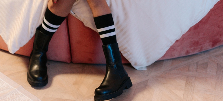 A Girl Wearing Black Leather Boots