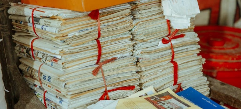 A stack of old magazines can be used as improvised at-home packing supplies