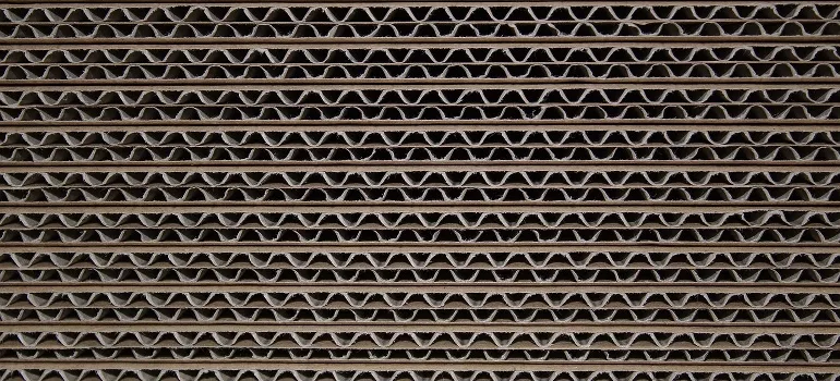 Multiple layers of corrugated cardboard.