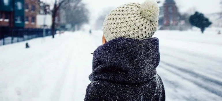 A woman in winter clothes.